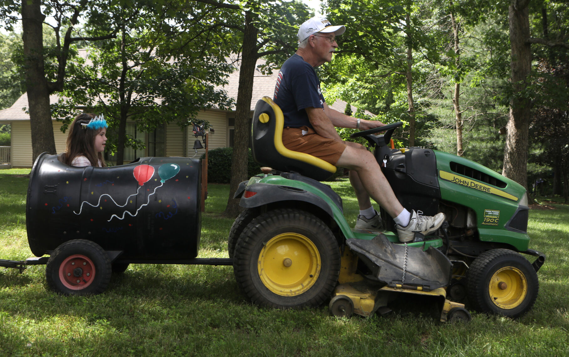 Evelyn Jackson rides a barrel train